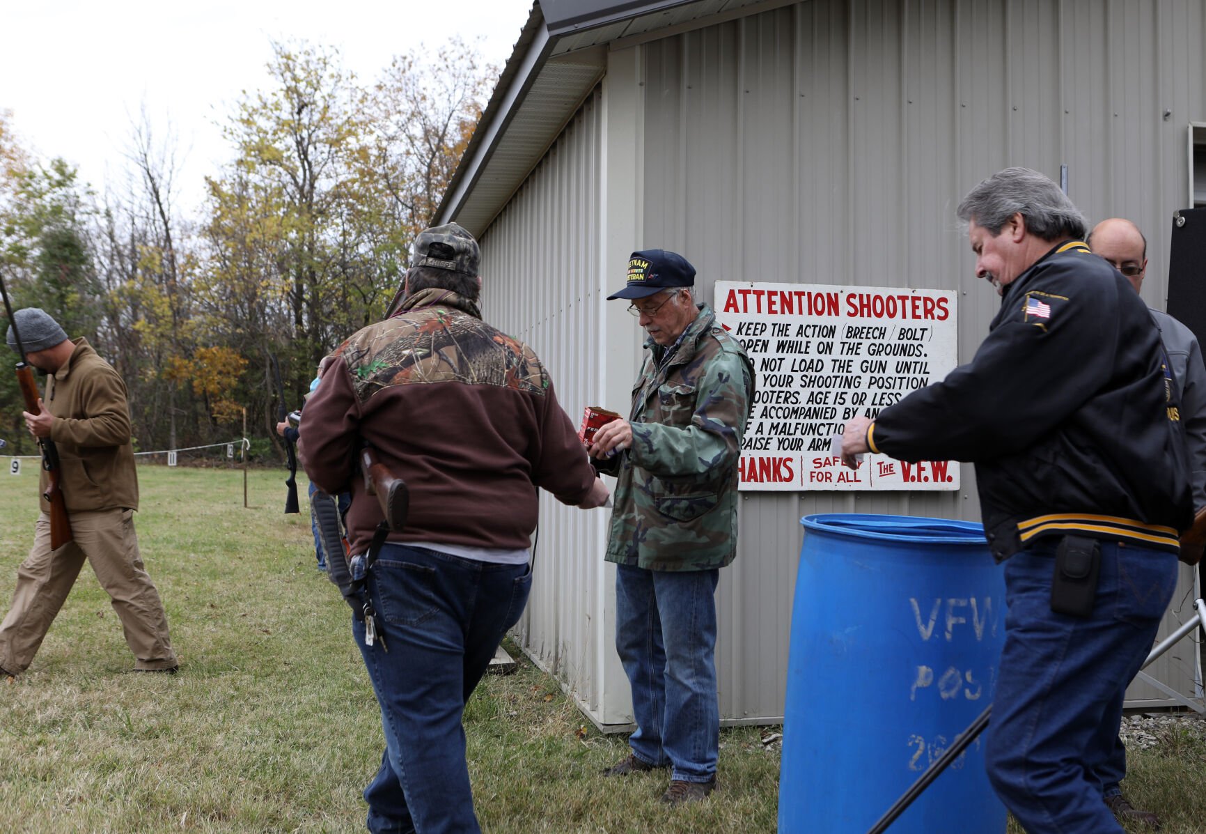 Ray Obermark hands out ammunition
